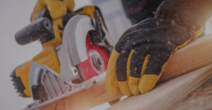 Saw cutting wood, backdrop for Yellowstone Lumber page